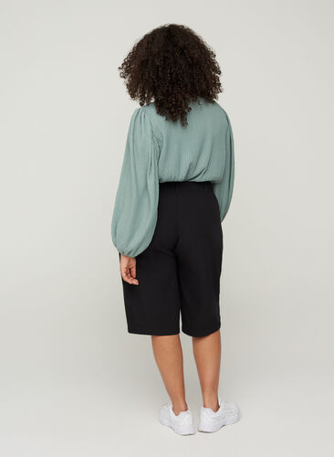 Plain-coloured bermuda shorts, Black, Model image number 0