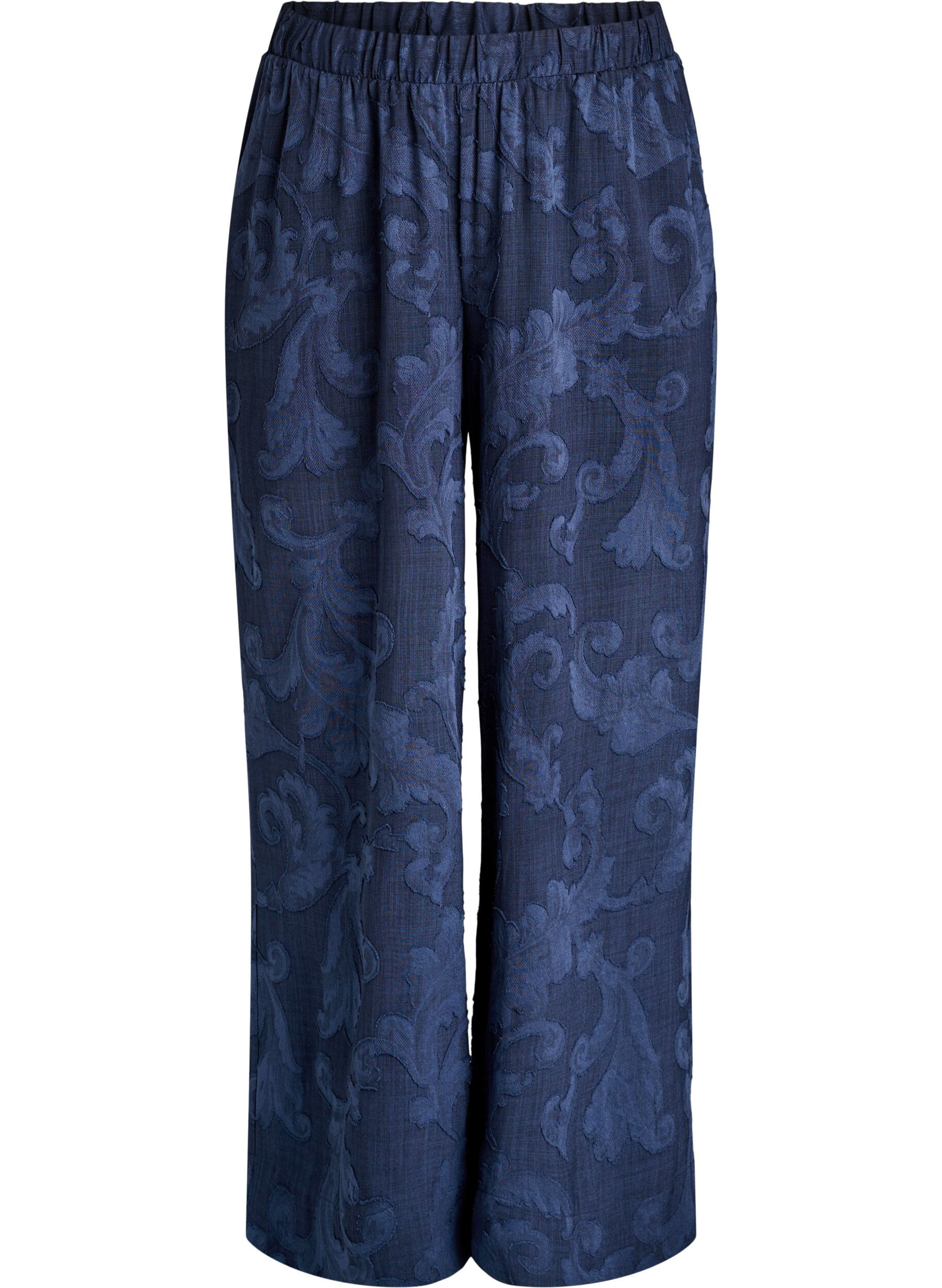 Loose trousers with a textured tone-on-tone pattern