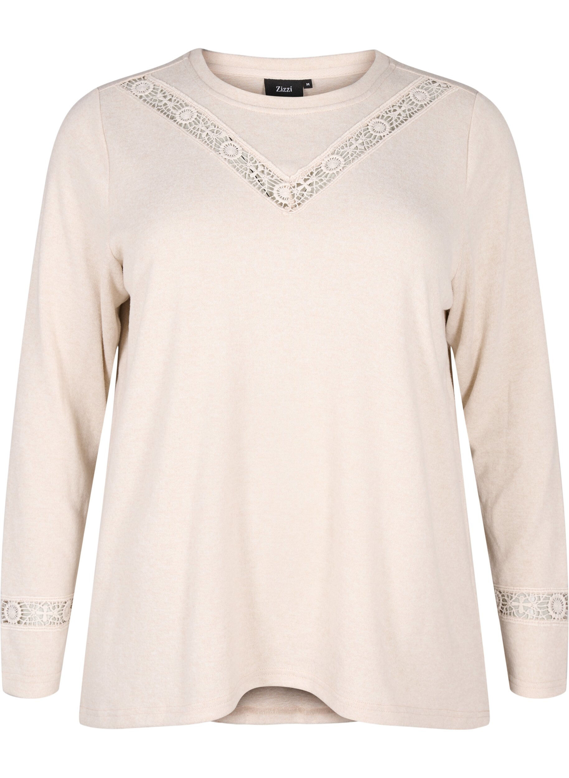 Blouse with embroidery details and long sleeves