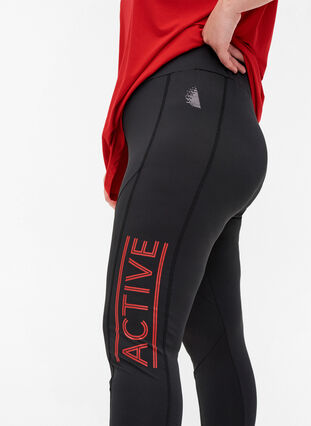 Cropped sports leggings with print details, Black, Model image number 2