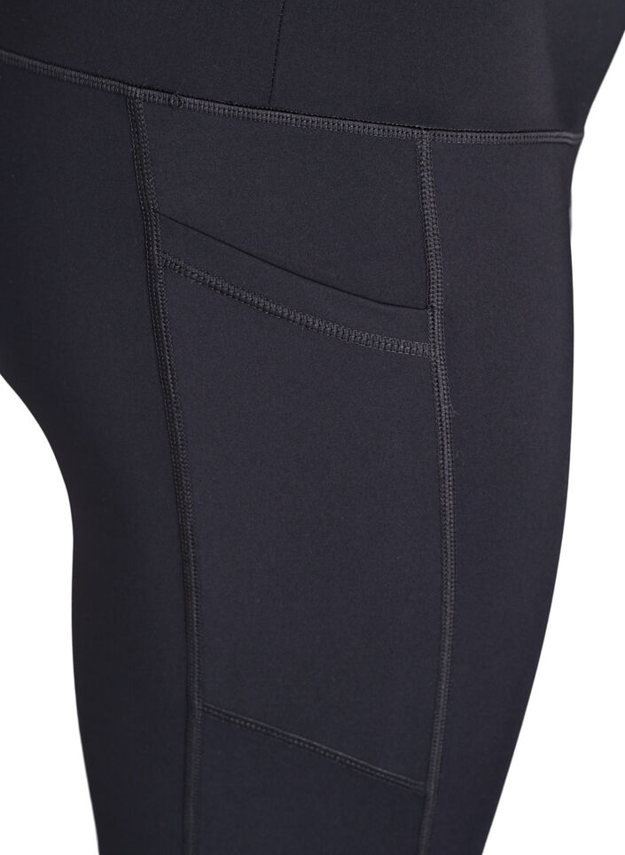 High-waisted 7/8 training tights with a pocket., Black, Packshot image number 3
