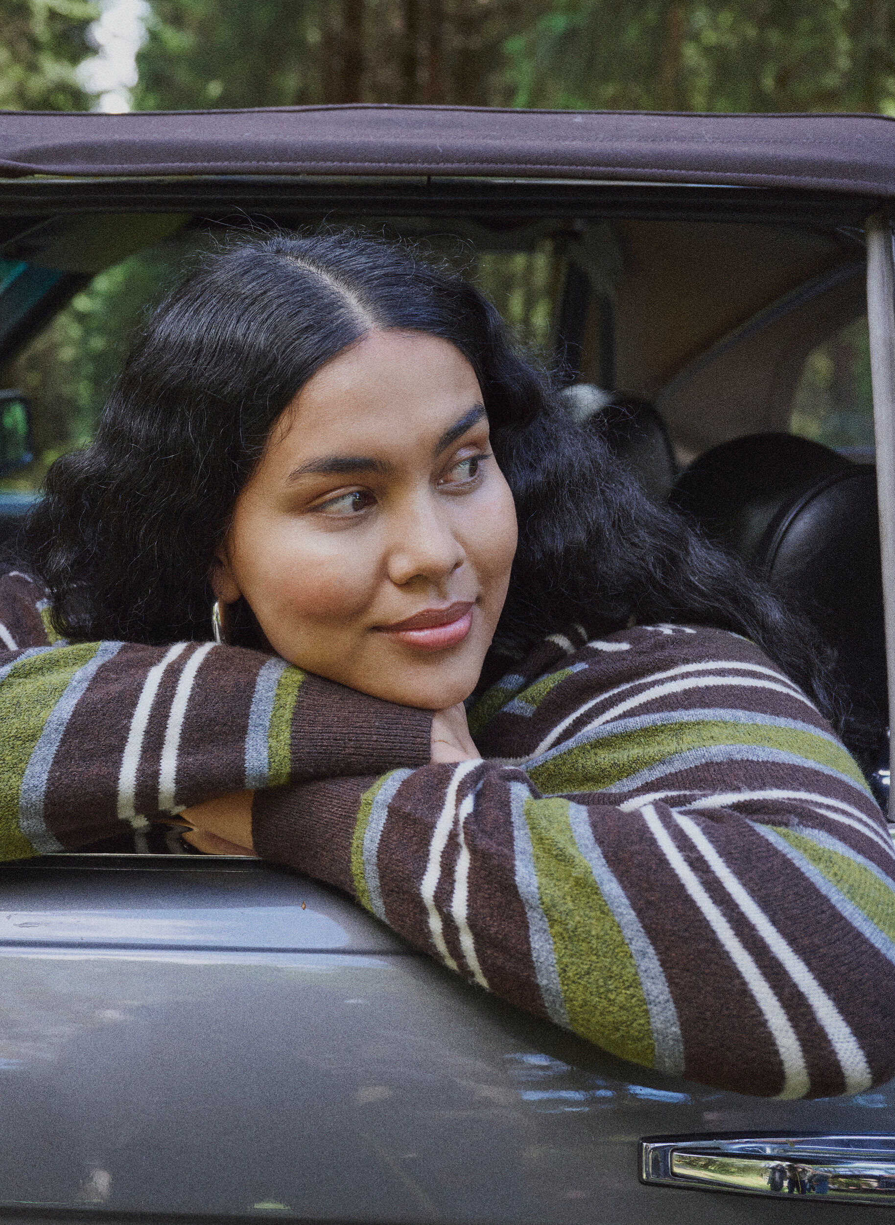 Knitted blouse with stripes and polo collar