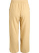 High-waisted cotton muslin trousers with loose legs, Yellow, Packshot image number 1