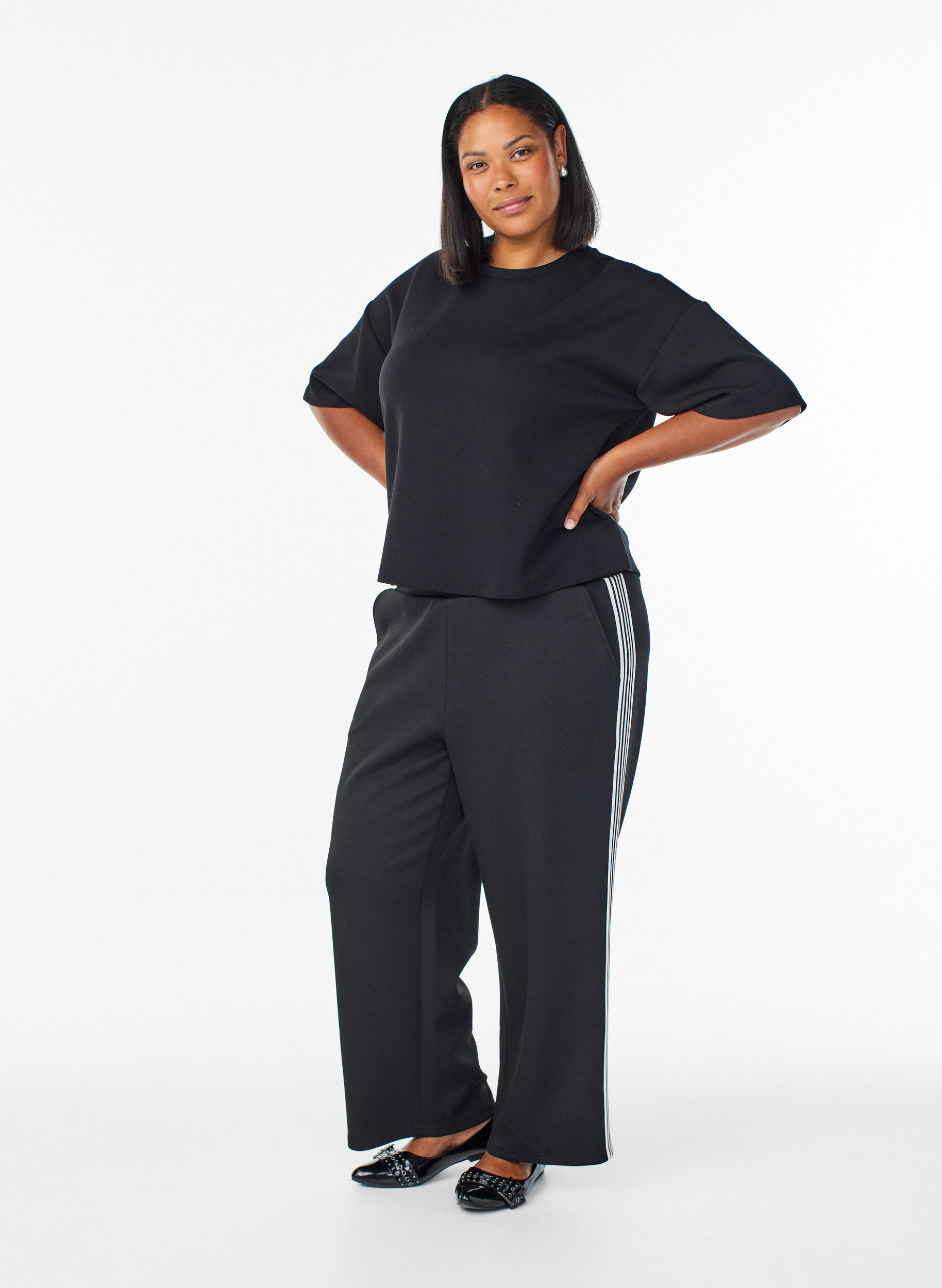 Trousers with side stripes, Black, Model