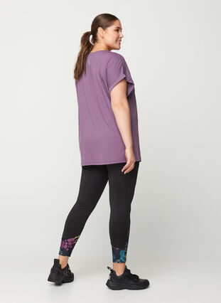Cropped sports leggings with a floral print, Black, Model image number 1
