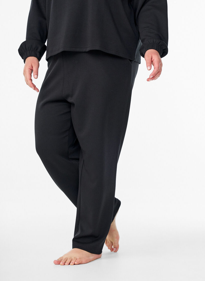 Loose trousers in modal mix, Black, Model image number 2