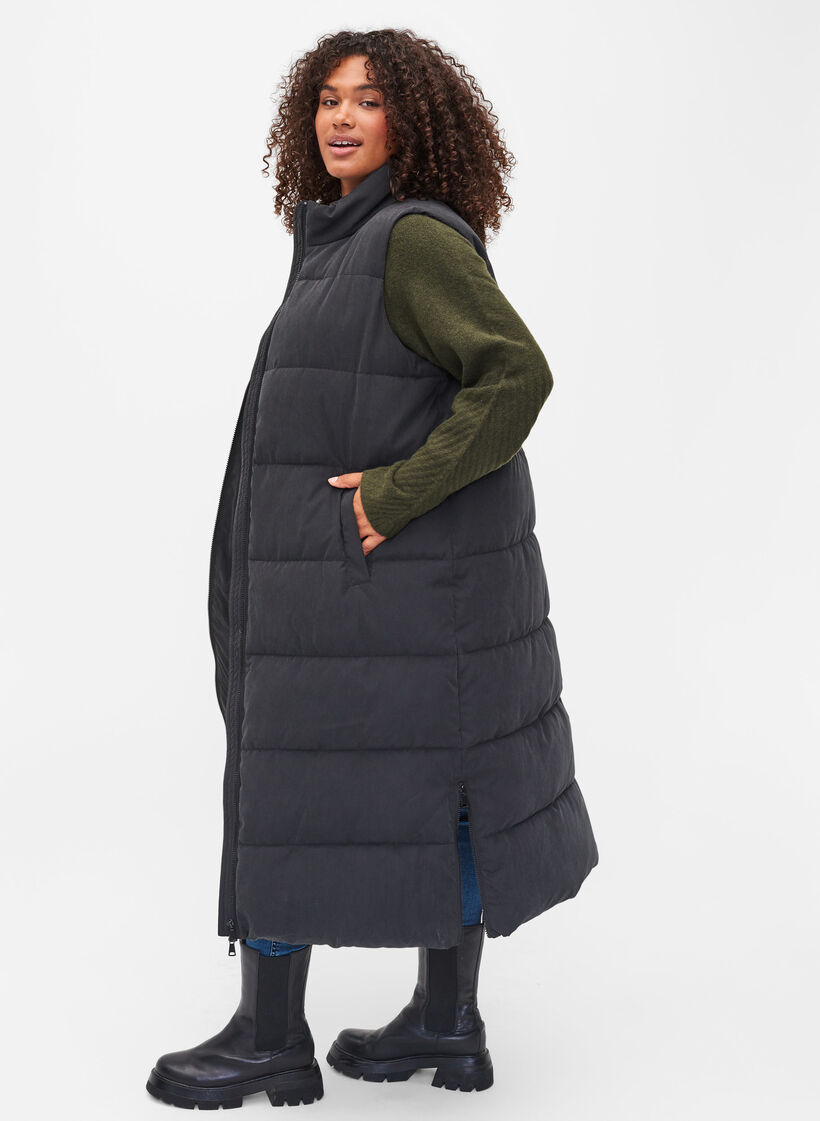 Long vest with high collar and pockets, Black, Model image number 1