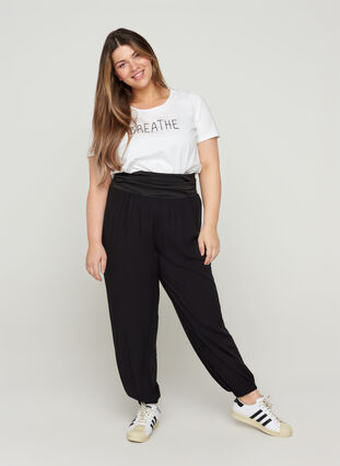 Loose trousers in viscose with elasticated cuffs, Black, Model image number 0