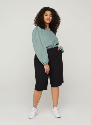 Plain-coloured bermuda shorts, Black, Model image number 1