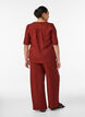 Loose trousers with elasticated waistband and pockets, Red, Model image number 1