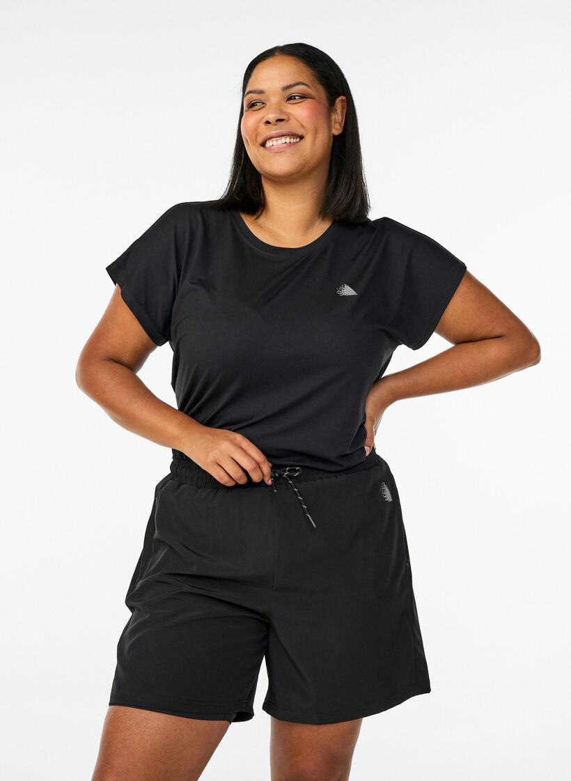 Training shorts with inner shorts and a phone pocket, Black, Model image number 0