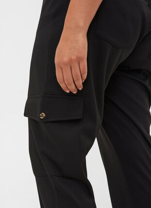 Loose trousers with elasticated trim and pockets, Black, Model image number 2