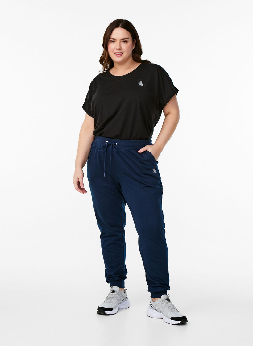 Loose workout trousers with pockets, Blue, Model image number 0