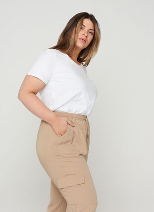 Loose trousers with large pockets, Nomad, Model image number 2
