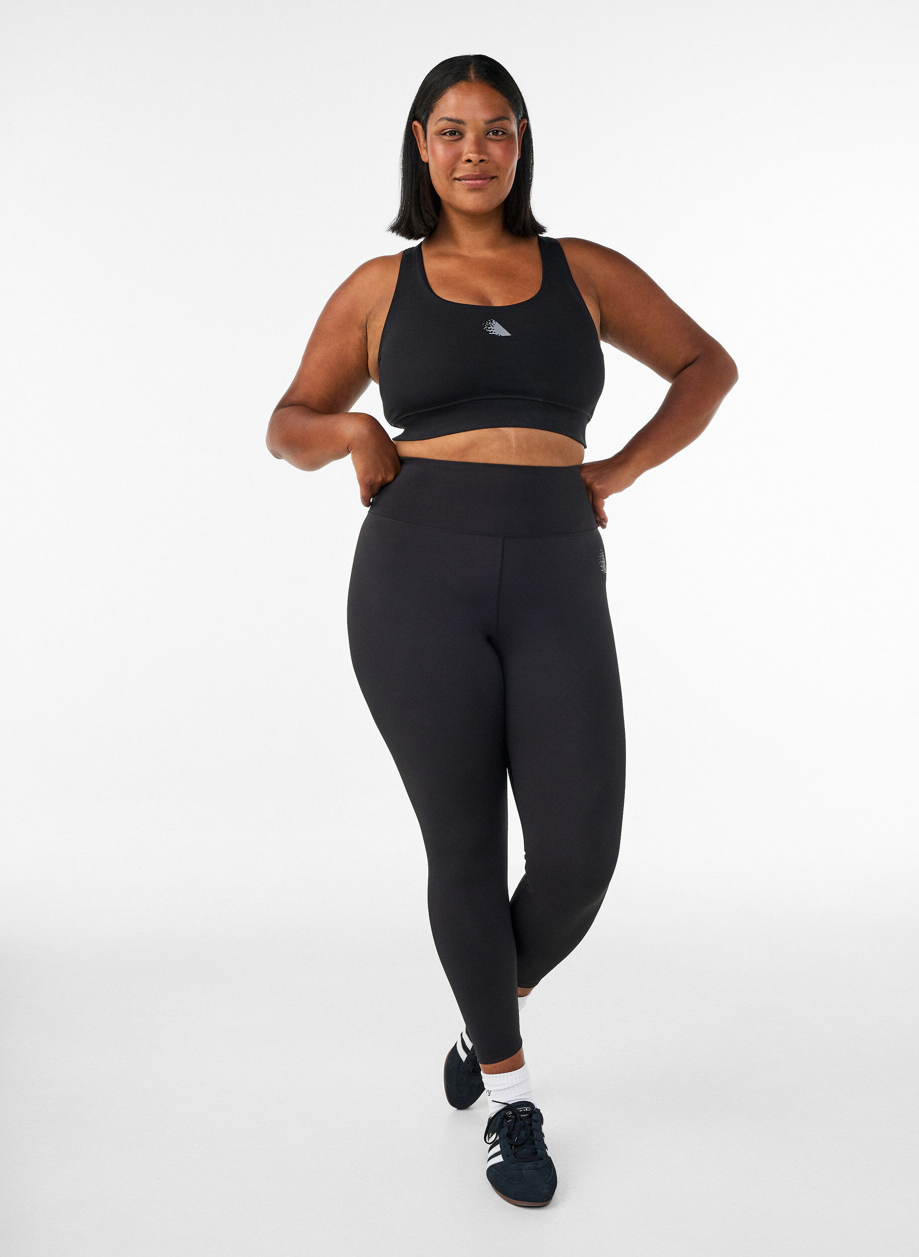 Training tights with a high waist and pocket in the waistband, Black, Model