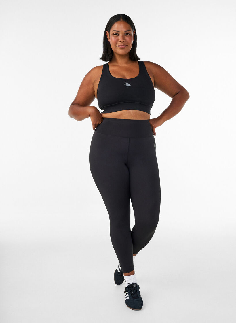 Training tights with a high waist and pocket in the waistband, Black, Model image number 0