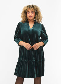 Velour dress with ruffle collar and 3/4 sleeves, Scarab, Model