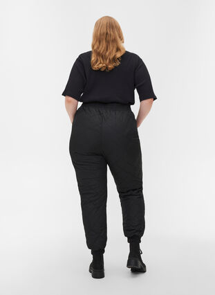 Quilted thermal trousers with pockets, Black, Model image number 1