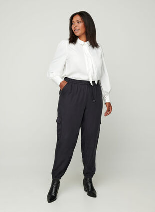 Lyocell trousers with large pockets, Black, Model image number 2