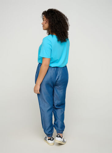 Loose trousers in lyocell, Medium Blue Denim, Model image number 1
