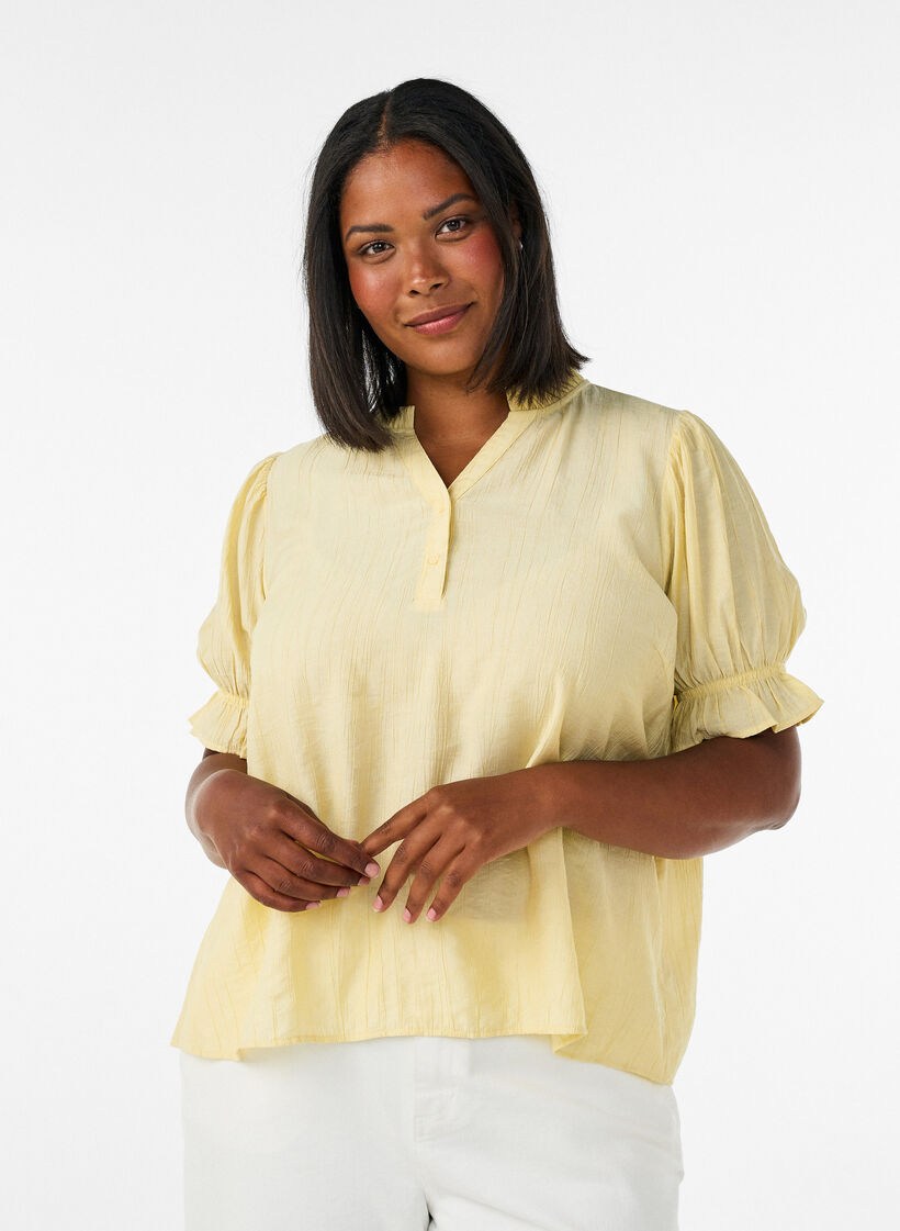 Short-sleeved blouse in a viscose blend with texture and ruffle sleeves, Yellow, Model image number 0