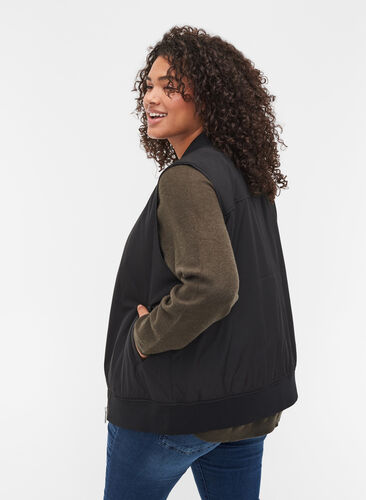 Short vest with zip and ribbed trim, Black, Model image number 1