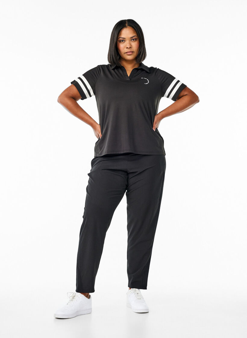 Sporty polo shirt with stripe details, Black, Model image number 1