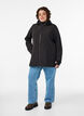 Short softshell jacket with detachable hood, Black, Model image number 1