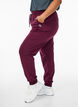 Loose tracksuit trousers with pockets, Red, Model image number 0