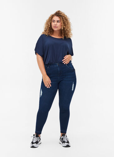 Super slim Amy jeans with distressed look, Dark blue denim, Model image number 0