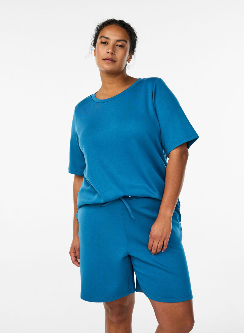 Shorts made of modal mix with pockets, Petrol, Model image number 0