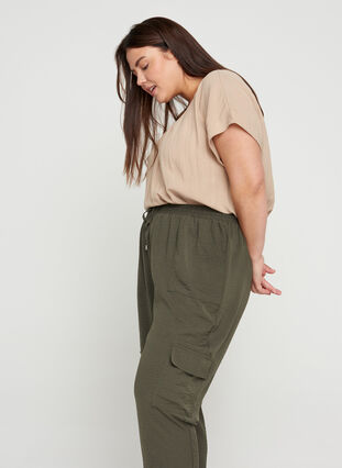 Loose trousers with large pockets, Black Olive, Model image number 2