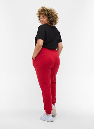 Loose sweatpants with pockets, Red, Model image number 1