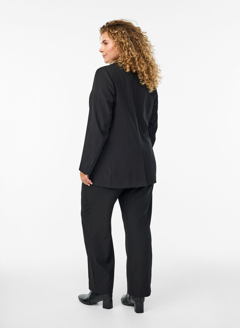 Loose trousers with pockets, Black, Model image number 1