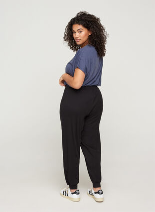 Loose trousers in ribbed fabric, Black, Model image number 1
