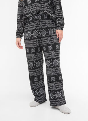 Patterned pyjama trousers with drawstrings, Black AOP, Model image number 2