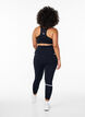 Running tights with light compression and side pockets, Black, Model image number 2