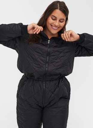 Quilted thermal ski suit with adjustable drawstring, Black, Model image number 2
