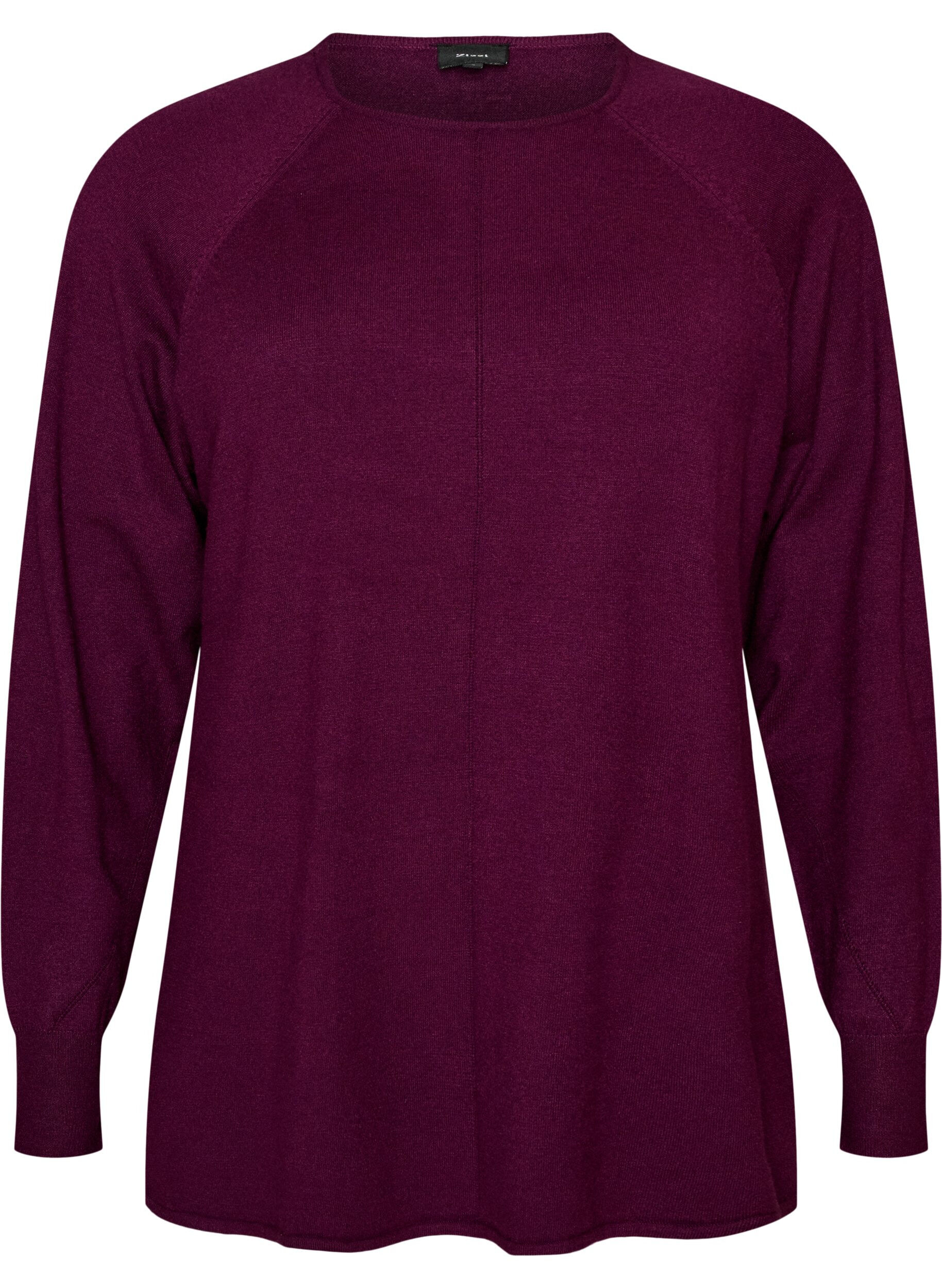 Knitted blouse with round neck and knitted pattern