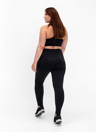 Training tights with fleece lining, Black, Model image number 1